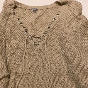 Tan v-neck cross sweater